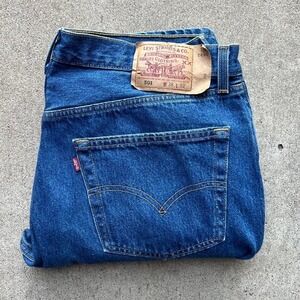 Vintage 90s Made in USA Levi's 501 denim Blue jeans